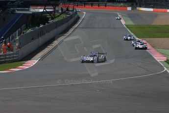 World © Octane Photographic Ltd. FIA World Endurance Championship (WEC), 6 Hours of Silverstone Race, UK, Sunday 12th April 2015. Porsche Team – Porsche 919 Hybrid - LM LMP1 – Romain Dumas, Neel Jani and Marc Lieb and Audi Sport Team Joest- Audi R18 e-tron Quatrro - LMP1 - Oliver Jarvis, Lucas di Grassi and Loic Duval. Digital Ref : 1225LB1D8668