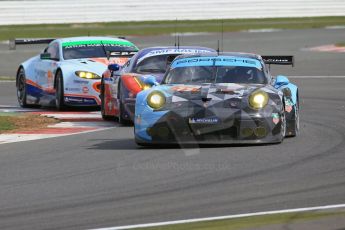 World © Octane Photographic Ltd. FIA World Endurance Championship (WEC), 6 Hours of Silverstone Race, UK, Sunday 12th April 2015. Dempsey-Proton Racing – Porsche 911 RSR - LMGTE Am – Patrick Dempsey, Patrick Long and Marco Seefried; SMP Racing – Ferrari F458 Italia GT2 - LMGTE Am – Viktor Shaytar, Aleksey Basov and Andrea Bertolini then Aston Martin Racing - Aston Martin Vantage GTE – LMGTE Am – Paul Dalla Lana, Pedro Lamy and Mathias Lauda. Digital Ref : 1225LB1D8788
