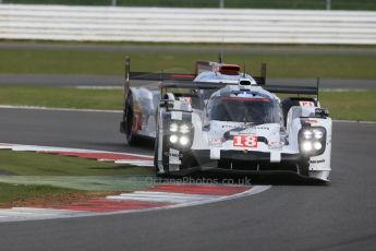 World © Octane Photographic Ltd. FIA World Endurance Championship (WEC), 6 Hours of Silverstone Race, UK, Sunday 12th April 2015. Porsche Team – Porsche 919 Hybrid - LM LMP1 – Romain Dumas, Neel Jani and Marc Lieb and Audi Sport Team Joest- Audi R18 e-tron Quatrro - LMP1 - Andre Lotterer, Benoit Treluyer and Marcel Fassler. Digital Ref : 1225LB1D8961