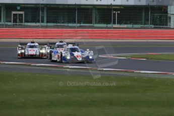 World © Octane Photographic Ltd. FIA World Endurance Championship (WEC), 6 Hours of Silverstone Race, UK, Sunday 12th April 2015. Toyota Racing – Toyota TS040 Hybrid - LMP1 - Anthony Davidson, Sebastien Buemi and Kazuki Nakajima and Audi Sport Team Joest- Audi R18 e-tron Quatrro - LMP1 - Andre Lotterer, Benoit Treluyer and Marcel Fassler followed by Oliver Jarvis, Lucas di Grassi and Loic Duval. Digital Ref : 1225LB1D9529