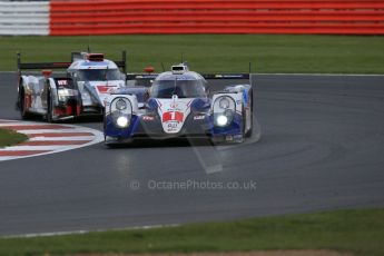 World © Octane Photographic Ltd. FIA World Endurance Championship (WEC), 6 Hours of Silverstone Race, UK, Sunday 12th April 2015. Toyota Racing – Toyota TS040 Hybrid - LMP1 - Anthony Davidson, Sebastien Buemi and Kazuki Nakajima and Audi Sport Team Joest- Audi R18 e-tron Quatrro - LMP1 - Andre Lotterer, Benoit Treluyer and Marcel Fassler. Digital Ref : 1225LB1D9534