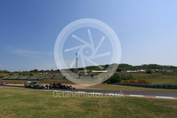 World © Octane Photographic Ltd. Mercedes AMG Petronas F1 W06 Hybrid – Nico Rosberg over takes Scuderia Toro Rosso STR10 – Carlos Sainz Jnr. . Friday 24th July 2015, F1 Hungarian GP Practice 1, Hungaroring, Hungary. Digital Ref: 1346LB5D0362