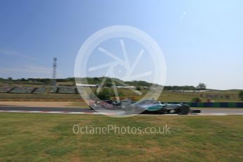 World © Octane Photographic Ltd. Mercedes AMG Petronas F1 W06 Hybrid – Nico Rosberg over takes Scuderia Toro Rosso STR10 – Carlos Sainz Jnr. . Friday 24th July 2015, F1 Hungarian GP Practice 1, Hungaroring, Hungary. Digital Ref: 1346LB5D0364