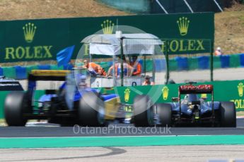 World © Octane Photographic Ltd. Lotus F1 Team E23 Hybrid – Pastor Maldonado and Sauber F1 Team C34-Ferrari – Felipe Nasr. Friday 24th July 2015, F1 Hungarian GP Practice 2, Hungaroring, Hungary. Digital Ref: 1348CB7D8140