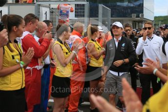 World © Octane Photographic Ltd. Mercedes AMG Petronas F1 W06 Hybrid – Nico Rosberg and McLaren Honda MP4/30 - Jenson Button. Sunday 26th July 2015, F1 Hungarian GP - Drivers Parade, Hungaroring, Hungary. Digital Ref: 1359LB5D1901
