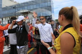 World © Octane Photographic Ltd. Mercedes AMG Petronas F1 W06 Hybrid – Nico Rosberg and McLaren Honda MP4/30 - Jenson Button. Sunday 26th July 2015, F1 Hungarian GP - Drivers Parade, Hungaroring, Hungary. Digital Ref: 1359LB5D1910