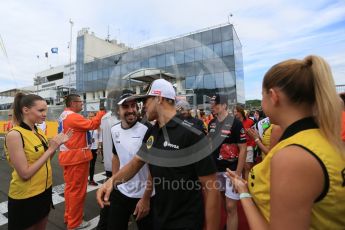 World © Octane Photographic Ltd. Lotus F1 Team E23 Hybrid – Pastor Maldonado and McLaren Honda MP4/30 – Fernando Alonso. Sunday 26th July 2015, F1 Hungarian GP - Drivers Parade, Hungaroring, Hungary. Digital Ref: 1359LB5D1929