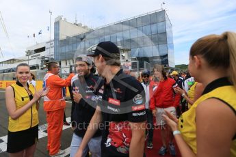 World © Octane Photographic Ltd. Scuderia Toro Rosso STR10 – Carlos Sainz Jnr and Max Verstappen. Sunday 26th July 2015, F1 Hungarian GP - Drivers Parade, Hungaroring, Hungary. Digital Ref: 1359LB5D1933