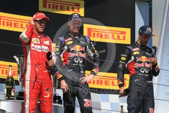 World © Octane Photographic Ltd. Scuderia Ferrari SF15-T– Sebastian Vettel, Infiniti Red Bull Racing RB11 – Daniil Kvyat and Daniel Ricciardo. Sunday 26th July 2015, F1 Hungarian GP Race - Podium, Hungaroring, Hungary. Digital Ref: 1361LB1D3170