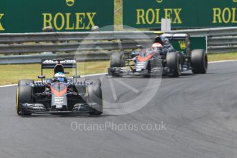 World © Octane Photographic Ltd. McLaren Honda MP4/30 – Fernando Alonso and Jenson Button. Sunday 26th July 2015, F1 Hungarian GP Race, Hungaroring, Hungary. Digital Ref: 1360CB1L7504
