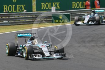 World © Octane Photographic Ltd. Mercedes AMG Petronas F1 W06 Hybrid – Lewis Hamilton and Nico Rosberg. Sunday 26th July 2015, F1 Hungarian GP Race, Hungaroring, Hungary. Digital Ref: 1360CB1L7533