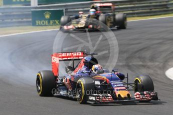 World © Octane Photographic Ltd. Scuderia Toro Rosso STR10 – Max Verstappen and Lotus F1 Team E23 Hybrid – Romain Grosjean. Sunday 26th July 2015, F1 Hungarian GP Race, Hungaroring, Hungary. Digital Ref: 1360CB1L7567