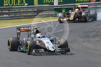 World © Octane Photographic Ltd. Sahara Force India VJM08B – Sergio Perez and Lotus F1 Team E23 Hybrid – Pastor Maldonado. Sunday 26th July 2015, F1 Hungarian GP Race, Hungaroring, Hungary. Digital Ref: 1360CB1L7583