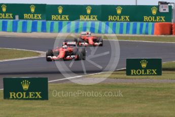 World © Octane Photographic Ltd. Scuderia Ferrari SF15-T– Sebastian Vettel and Kimi Raikkonen. Sunday 26th July 2015, F1 Hungarian GP Race, Hungaroring, Hungary. Digital Ref: 1360CB1L7677