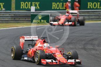World © Octane Photographic Ltd. Scuderia Ferrari SF15-T– Sebastian Vettel and Kimi Raikkonen. Sunday 26th July 2015, F1 Hungarian GP Race, Hungaroring, Hungary. Digital Ref: 1360CB1L7685