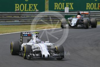 World © Octane Photographic Ltd. Williams Martini Racing FW37 – Valtteri Bottas and Sahara Force India VJM08B – Nico Hulkenberg. Sunday 26th July 2015, F1 Hungarian GP Race, Hungaroring, Hungary. Digital Ref: 1360CB1L7705