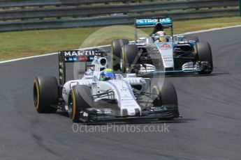 World © Octane Photographic Ltd. Williams Martini Racing FW37 – Felipe Massa and Mercedes AMG Petronas F1 W06 Hybrid – Lewis Hamilton. Sunday 26th July 2015, F1 Hungarian GP Race, Hungaroring, Hungary. Digital Ref: