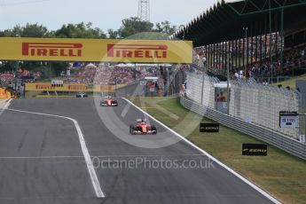World © Octane Photographic Ltd. Scuderia Ferrari SF15-T– Sebastian Vettel and Kimi Raikkonen and Mercedes AMG Petronas F1 W06 Hybrid – Nico Rosberg. Sunday 26th July 2015, F1 Hungarian GP Race, Hungaroring, Hungary. Digital Ref: 1360LB1D2503