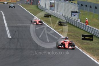 World © Octane Photographic Ltd. Scuderia Ferrari SF15-T– Sebastian Vettel and Kimi Raikkonen and Mercedes AMG Petronas F1 W06 Hybrid – Nico Rosberg. Sunday 26th July 2015, F1 Hungarian GP Race, Hungaroring, Hungary. Digital Ref: 1360LB1D2509