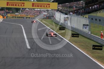 World © Octane Photographic Ltd. Scuderia Ferrari SF15-T– Sebastian Vettel and Kimi Raikkonen lead Mercedes AMG Petronas F1 W06 Hybrid – Nico Rosberg. Sunday 26th July 2015, F1 Hungarian GP Race, Hungaroring, Hungary. Digital Ref: