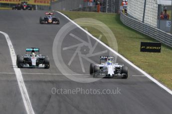 World © Octane Photographic Ltd. Williams Martini Racing FW37 – Felipe Massa and Mercedes AMG Petronas F1 W06 Hybrid – Lewis Hamilton. Sunday 26th July 2015, F1 Hungarian GP Race, Hungaroring, Hungary. Digital Ref: