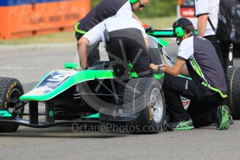 World © Octane Photographic Ltd. Saturday 25th July 2015. Status Grand Prix – Sandy Stuvik's car being worked on after being towed into the pits. GP3 Race 1 – Hungaroring, Hungary. Digital Ref. : 1355CB7D9031