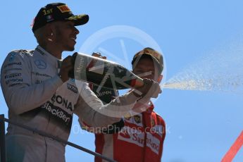 World © Octane Photographic Ltd. Mercedes AMG Petronas F1 W06 Hybrid – Lewis Hamilton (1st), Scuderia Ferrari SF15-T– Sebastian Vettel (2nd). Sunday 6th September 2015, F1 Italian GP Podium, Monza, Italy. Digital Ref: 1420LB1D3148