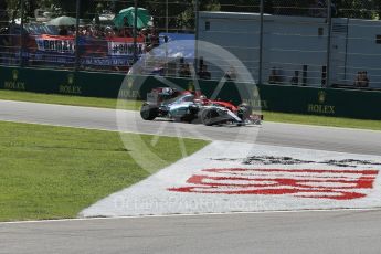 World © Octane Photographic Ltd. Mercedes AMG Petronas F1 W06 Hybrid – Lewis Hamilton leads the Scuderia Ferrari SF15-T of Sebastian Vettel into the 1st chicane. Sunday 6th September 2015, F1 Italian GP Race, Monza, Italy. Digital Ref: 1419LB1D2630