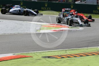 World © Octane Photographic Ltd. Mercedes AMG Petronas F1 W06 Hybrid – Lewis Hamilton leads the Scuderia Ferrari SF15-T of Sebastian Vettel into the 1st chicane. Sunday 6th September 2015, F1 Italian GP Race, Monza, Italy. Digital Ref: 1419LB1D2635