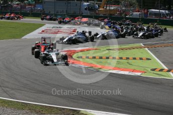 World © Octane Photographic Ltd. Mercedes AMG Petronas F1 W06 Hybrid – Lewis Hamilton leads the Scuderia Ferrari SF15-T of Sebastian Vettel into the 1st chicane. Sunday 6th September 2015, F1 Italian GP Race, Monza, Italy. Digital Ref: 1419LB1D2651