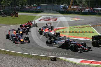 World © Octane Photographic Ltd. Loose debris as the pack works through the first chicane. Sunday 6th September 2015, F1 Italian GP Race, Monza, Italy. Digital Ref: 1419LB1D2687