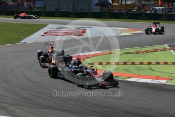 World © Octane Photographic Ltd. McLaren Honda MP4/30 – Fernando Alonso and Infiniti Red Bull Racing RB11 – Daniil Kvyat. Sunday 6th September 2015, F1 Italian GP Race, Monza, Italy. Digital Ref: 1419LB1D2820