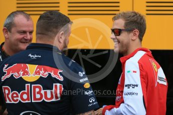 World © Octane Photographic Ltd. Scuderia Ferrari SF15-T– Sebastian Vettel and Red Bull crew. Friday 4th September 2015, F1 Italian GP Practice 1, Monza, Italy. Digital Ref: 1405LB1D8686