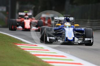 World © Octane Photographic Ltd. Sauber F1 Team C34-Ferrari – Marcus Ericsson and Scuderia Ferrari SF15-T– Kimi Raikkonen. Friday 4th September 2015, F1 Italian GP Practice 1, Monza, Italy. Digital Ref: 1405LB7D5525