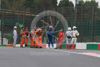World © Octane Photographic Ltd. Marshals gather for pre-session inspection. Friday 25th September 2015, F1 Japanese Grand Prix, Practice 1, Suzuka. Digital Ref: