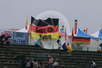World © Octane Photographic Ltd. Sebastian Vettel and Jarno Trulli flags. Friday 25th September 2015, F1 Japanese Grand Prix, Practice 1, Suzuka. Digital Ref: