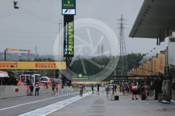 World © Octane Photographic Ltd. Pitlane at start of session. Friday 25th September 2015, F1 Japanese Grand Prix, Practice 2, Suzuka. Digital Ref: