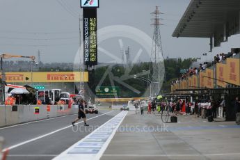 World © Octane Photographic Ltd. Pitlane at start of session. Friday 25th September 2015, F1 Japanese Grand Prix, Practice 2, Suzuka. Digital Ref: