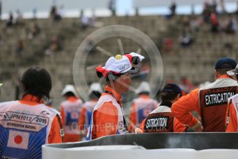 World © Octane Photographic Ltd. Marshals. Saturday 26th September 2015, F1 Japanese Grand Prix, Practice 3, Suzuka. Digital Ref: