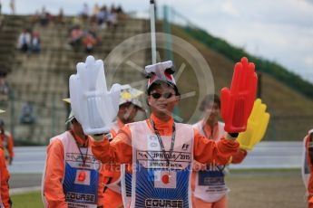 World © Octane Photographic Ltd. Marshals. Saturday 26th September 2015, F1 Japanese Grand Prix, Practice 3, Suzuka. Digital Ref: