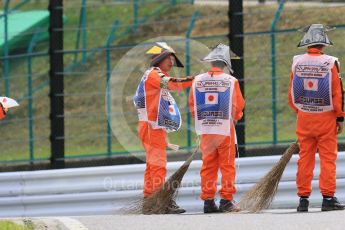 World © Octane Photographic Ltd. Marshals. Saturday 26th September 2015, F1 Japanese Grand Prix, Practice 3, Suzuka. Digital Ref: