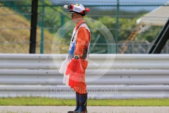 World © Octane Photographic Ltd. Marshals. Saturday 26th September 2015, F1 Japanese Grand Prix, Practice 3, Suzuka. Digital Ref: