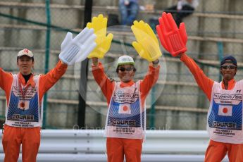 World © Octane Photographic Ltd. Marshals. Saturday 26th September 2015, F1 Japanese Grand Prix, Practice 3, Suzuka. Digital Ref: