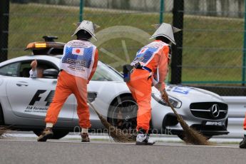 World © Octane Photographic Ltd. Marshals. Saturday 26th September 2015, F1 Japanese Grand Prix, Practice 3, Suzuka. Digital Ref: