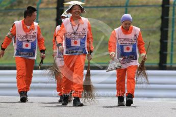 World © Octane Photographic Ltd. Marshals. Saturday 26th September 2015, F1 Japanese Grand Prix, Practice 3, Suzuka. Digital Ref: