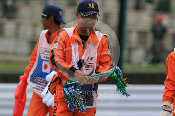 World © Octane Photographic Ltd. Marshals. Saturday 26th September 2015, F1 Japanese Grand Prix, Practice 3, Suzuka. Digital Ref: