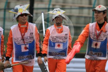 World © Octane Photographic Ltd. Marshals. Saturday 26th September 2015, F1 Japanese Grand Prix, Practice 3, Suzuka. Digital Ref: