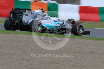 World © Octane Photographic Ltd. Williams Martini Racing FW37 – Valtteri Bottas and Mercedes AMG Petronas F1 W06 Hybrid – Nico Rosberg. Saturday 26th September 2015, F1 Japanese Grand Prix, Practice 3, Suzuka. Digital Ref: