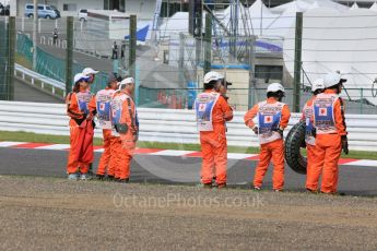 World © Octane Photographic Ltd. Marshals. Saturday 26th September 2015, F1 Japanese Grand Prix, Qualifying, Suzuka. Digital Ref: