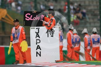 World © Octane Photographic Ltd. Marshals. Saturday 26th September 2015, F1 Japanese Grand Prix, Qualifying, Suzuka. Digital Ref: